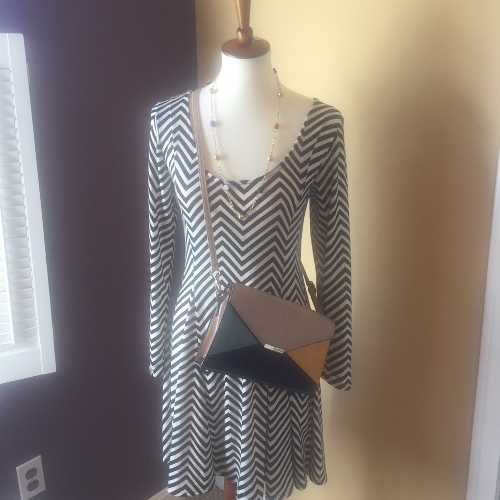 Cream and black A line dress.